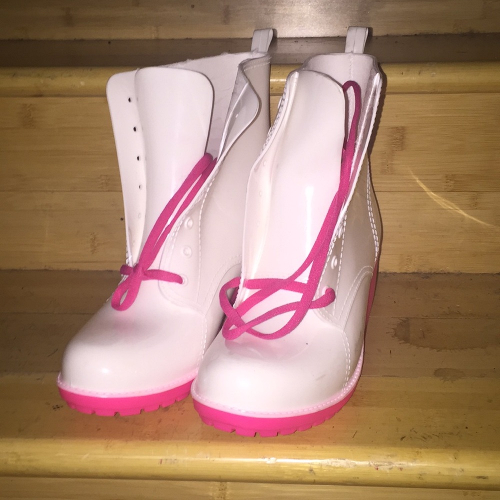 White and pink jelly rain shoes